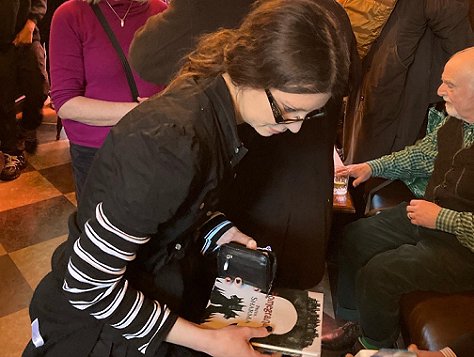 Image of people buying books at the HWA/Absinthe event in London
