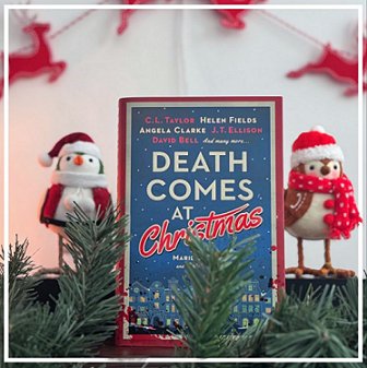 photograph of a copy of Death Comes at Christmas, edited by Marie O'Regan and Paul Kane, standing between a penguin and a robin wearing Christmas hats and scarved, in front of a red reindeer garland on a white background. Pine branches lie in front of the tableau