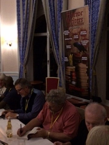 Signing at the party. L to R: Jan Edwards, C.C. Adams, Reggie Oliver, Robert Shearman, Stephen Jones
