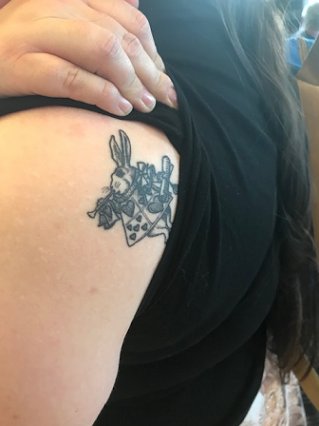 White rabbit tattoo