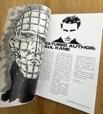 photograph showing the title page of RBZEEN's interview with Paul Kane. Facing illustration is of Pinhead