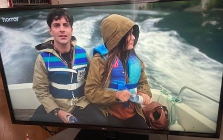 Still from Sacrifice movie - man and woman in boat